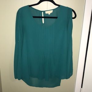 Teal blouse with open arms